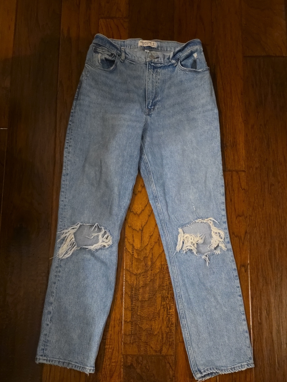 Women’s Light Blue Distressed Knee Jeans
